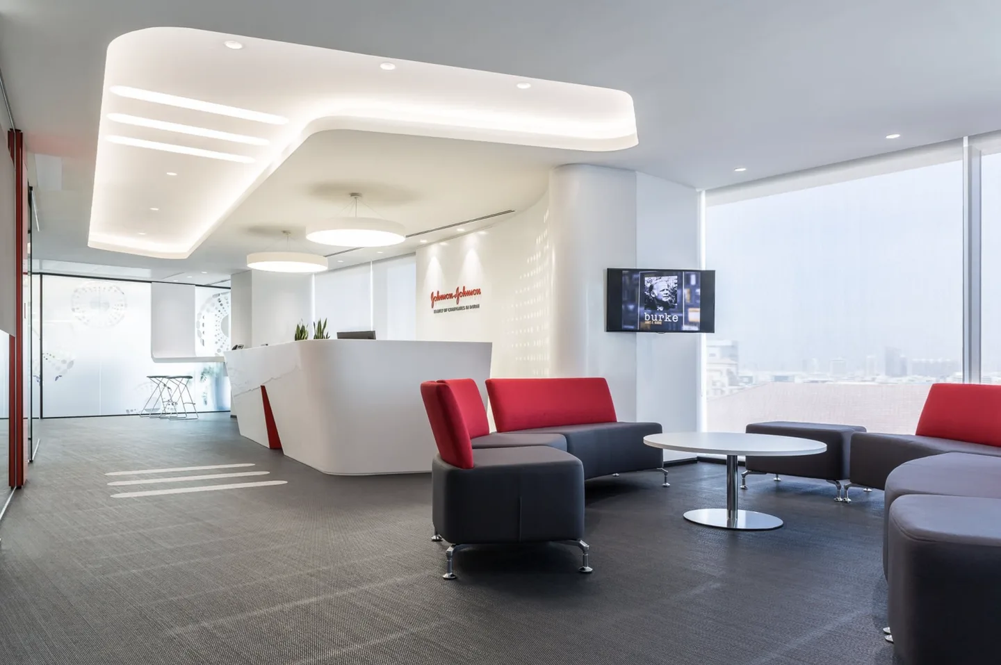 Johnson & Johnson reception area with illuminated architectural details