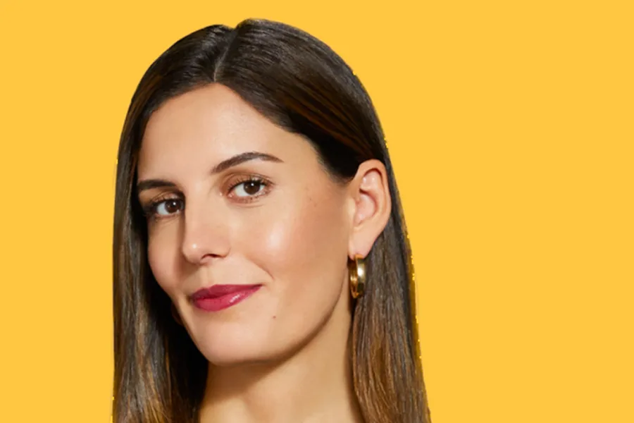 Portrait from Synchrony’s Business Schooled editorial platform against a yellow field