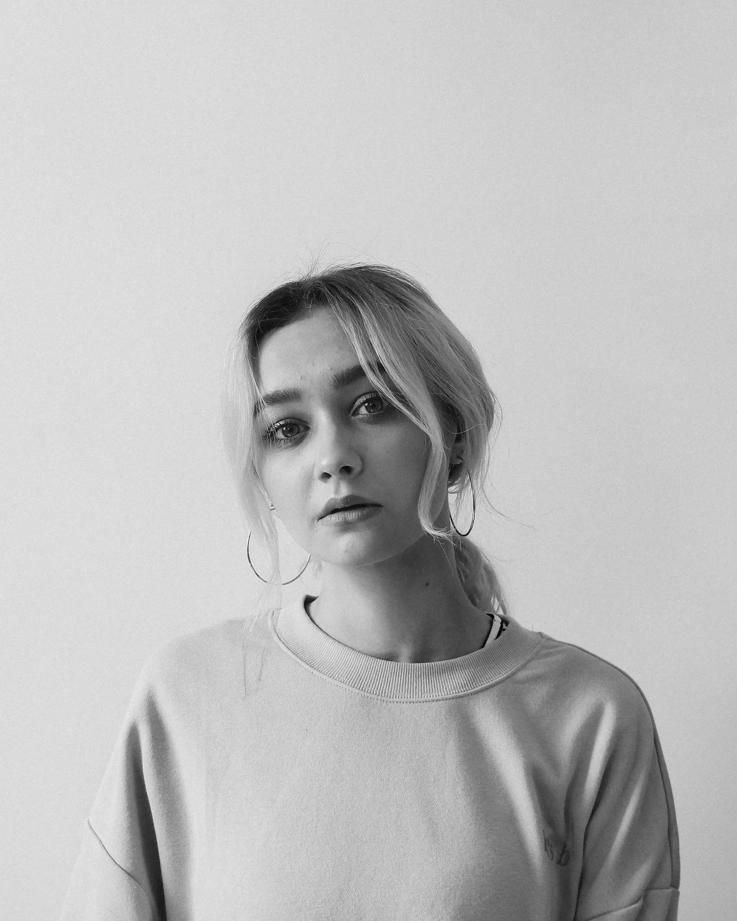 Studio portrait against a pale background